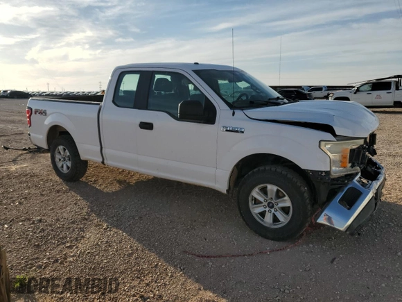 2018 Ford F-150 XL with VIN 1FTFX1E54JKC04497, listed as a Copart auction lot 53398455 with 198,473 mi miles and Salvage title. Bid and sale history available at DreamBid. Image 4.