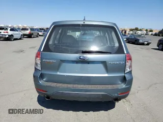 2009 Subaru Forester X with VIN JF2SH61619H757609, listed as a Copart auction lot 65048765 with 106,139 mi miles and Salvage title. Bid and sale history available at DreamBid. Image 6.