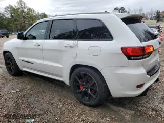 2021 Jeep Grand Cherokee SRT with VIN 1C4RJFDJ1MC561144, listed as a Copart auction lot 83961214 with 49,989 mi miles and Salvage Title. Bid and sale history available at carsss.com. Image 2.