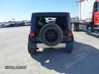 2013 Jeep Wrangler Unlimited Sahara with VIN 1C4BJWEG3DL617511, listed as a IAAI auction lot 41842979 with 149,980 mi miles and . Bid and sale history available at DreamBid. Image 16.