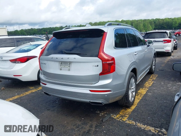 2018 Volvo XC90 Momentum z VIN YV4A22PK1J1326237, wystawiony jako IAAI lot #42224960 z przebiegiem 126 153 mil mil oraz . Historia ofert i sprzedaży dostępna na DreamBid. Obrazek 4.