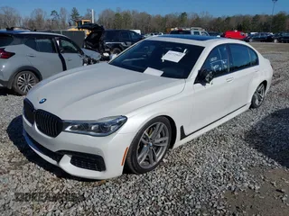 2017 BMW 7 Series 750i with VIN WBA7F0C34HGM21738, listed as a IAAI auction lot 41772933 with 62,923 mi miles and . Bid and sale history available at carsss.com. Image 2.