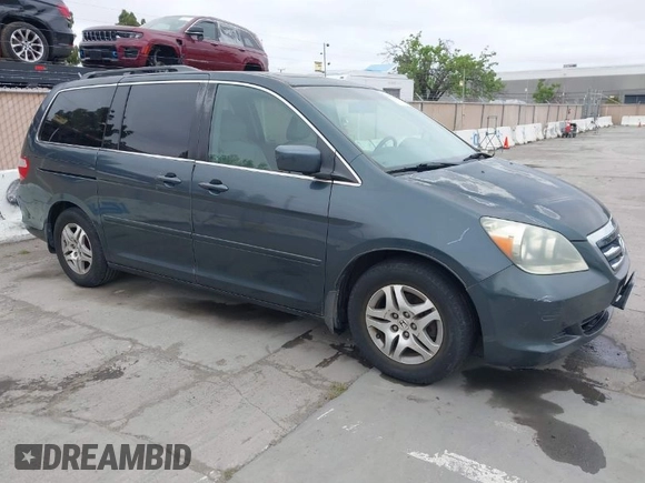 2006 Honda Odyssey EX-L with VIN 5FNRL38786B019441, listed as a IAAI auction lot 42074209 with 184,008 mi miles. Bid and sale history available at carsss.com. Image 1.