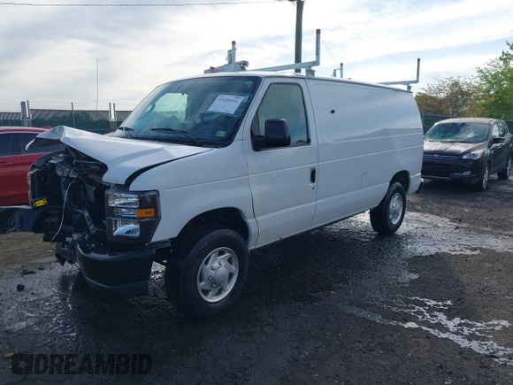 2011 Ford Econoline Cargo Commercial z VIN 1FTNE2EL6BDB35128, wystawiony jako IAAI lot #42088056 z przebiegiem 146 609 mil mil oraz . Historia ofert i sprzedaży dostępna na DreamBid. Obrazek 2.