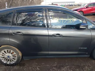 2017 Ford C-Max SE z VIN 1FADP5AU9HL108743, wystawiony jako IAAI lot #41697588 z przebiegiem 188 856 mil mil oraz . Historia ofert i sprzedaży dostępna na DreamBid. Obrazek 13.