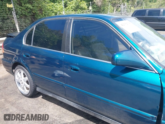1997 Honda Civic LX z VIN 2HGEJ6671VH574878, wystawiony jako IAAI lot #42332735 z przebiegiem 246 181 mil mil oraz . Historia ofert i sprzedaży dostępna na DreamBid. Obrazek 13.