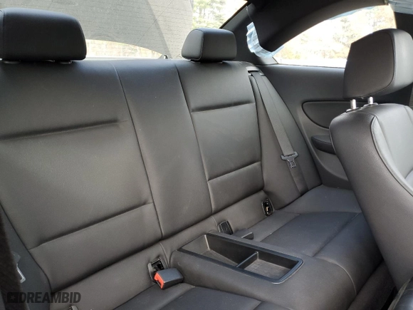 2013 BMW 1 Series 128i with VIN WBAUP9C57DVF46781, listed as a Copart auction lot 77449004 with 98,551 mi miles and Clean Title. Bid and sale history available at carsss.com. Image 10.