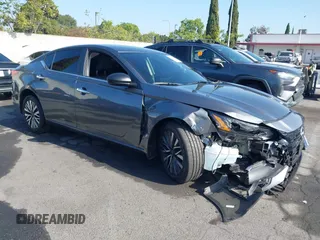 2024 Nissan Altima SV with VIN 1N4BL4DV6RN379704, listed as a IAAI auction lot 42311047 with 21,477 mi miles and . Bid and sale history available at DreamBid. Image 1.