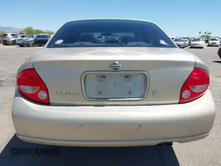 2000 Nissan Maxima GXE z VIN JN1CA31D0YT739248, wystawiony jako IAAI lot #42089086 z przebiegiem 140 979 mil mil oraz . Historia ofert i sprzedaży dostępna na DreamBid. Obrazek 16.