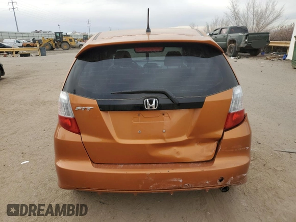 2009 Honda Fit Sport z VIN JHMGE88429S025410, wystawiony jako Copart lot #84963934 z przebiegiem 122 807 mil mil oraz Szkoda całkowita • Salvage title. Historia ofert i sprzedaży dostępna na DreamBid. Obrazek 6.