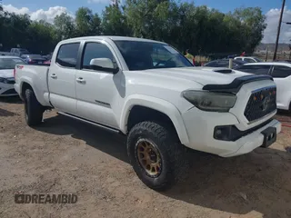 2018 Toyota Tacoma SR5 z VIN 3TMDZ5BN2JM037580, wystawiony jako IAAI lot #42248418 z przebiegiem 35 661 mil mil oraz . Historia ofert i sprzedaży dostępna na DreamBid. Obrazek 1.