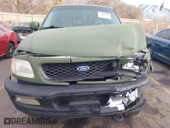 1997 Ford F-150 XL with VIN 1FTDX1861VKA60604, listed as a IAAI auction lot 41060909 with 269,715 mi miles. Bid and sale history available at carsss.com. Image 12.
