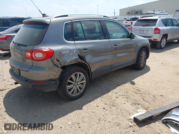 2011 Volkswagen Tiguan SEL w/Premium Navi with VIN WVGAV7AX0BW550059, listed as a IAAI auction lot 42071719 with 107,341 mi miles and . Bid and sale history available at DreamBid. Image 4.