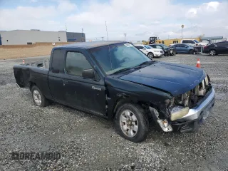 1999 Nissan Frontier XE with VIN 1N6DD26S6XC332458, listed as a Copart auction lot 48028715 with 182,706 mi miles and Salvage title. Bid and sale history available at DreamBid. Image 4.