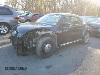 2014 Volkswagen Beetle 1.8T w/Premium z VIN 3VW517AT7EM819013, wystawiony jako Copart lot #79396864 z przebiegiem 128 377 mil mil oraz Szkoda całkowita • Salvage title. Historia ofert i sprzedaży dostępna na DreamBid. Obrazek 1.