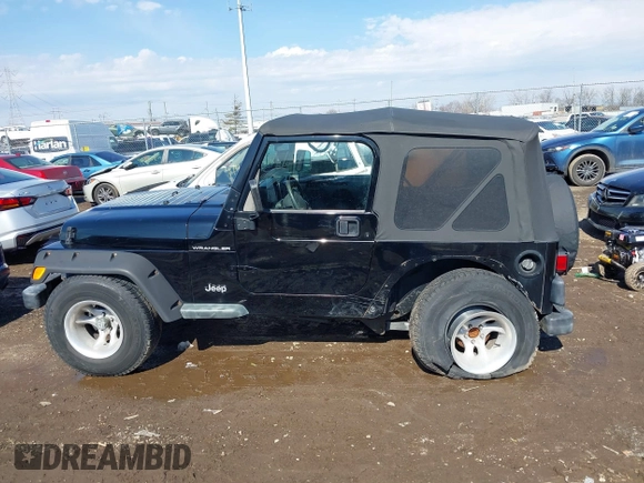 2002 Jeep Wrangler X with VIN 1J4FA39S52P770664, listed as a IAAI auction lot 41661580 with 122,445 mi miles. Bid and sale history available at carsss.com. Image 14.