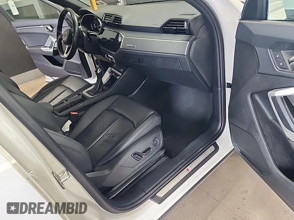 2023 Audi Q3 S line Premium with VIN WA1DECF37P1107583, listed as a IAAI auction lot 42708277 with 51,891 mi miles and . Bid and sale history available at DreamBid. Image 12.