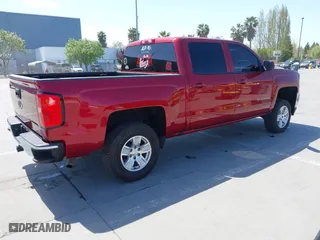 2018 Chevrolet Silverado 1500 LT with VIN 3GCUCRER8JG299111, listed as a IAAI auction lot 42063560 with 99,888 mi miles. Bid and sale history available at carsss.com. Image 4.
