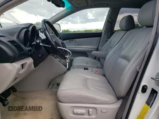 2006 Lexus RX 400h with VIN JTJHW31UX60023361, listed as a Copart auction lot 60489355 with 112,087 mi miles and Salvage title. Bid and sale history available at DreamBid. Image 7.