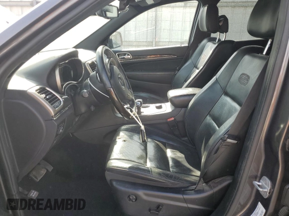 2014 Jeep Grand Cherokee Overland with VIN 1C4RJFCG4EC172361, listed as a Copart auction lot 49053155 with 144,916 mi miles and Salvage Title. Bid and sale history available at DreamBid. Image 7.