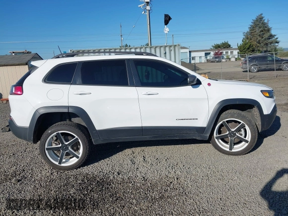 2021 Jeep Cherokee Trailhawk with VIN 1C4PJMBX9MD105888, listed as a IAAI auction lot 42065175 with 55,469 mi miles and . Bid and sale history available at DreamBid. Image 14.