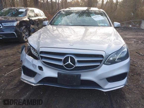 2014 Mercedes-Benz E 350 Luxury with VIN WDDHF8JB2EB043563, listed as a IAAI auction lot 41887276 with 73,003 mi miles and . Bid and sale history available at DreamBid. Image 12.