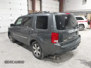 2012 Honda Pilot Touring with VIN 5FNYF4H99CB052034, listed as a IAAI auction lot 42023430 with 137,428 mi miles. Bid and sale history available at carsss.com. Image 3.