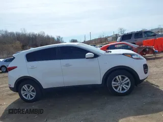 2018 Kia Sportage LX with VIN KNDPMCAC8J7372403, listed as a IAAI auction lot 41763496 with 92,651 mi miles and . Bid and sale history available at carsss.com. Image 13.