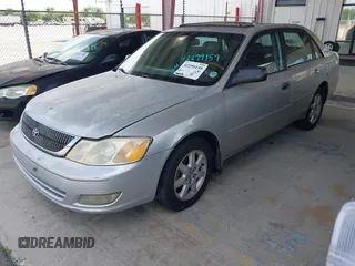 2001 Toyota Avalon XL z VIN 4T1BF28B71U120831, wystawiony jako IAAI lot #42299159 z przebiegiem 220 936 mil mil oraz . Historia ofert i sprzedaży dostępna na DreamBid. Obrazek 2.