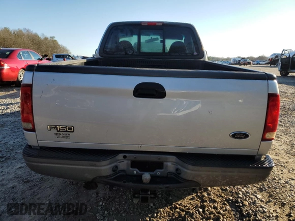 2002 Ford F-150 XL with VIN 1FTRF17202NB11513, listed as a Copart auction lot 85773084 with 120,443 mi miles and Salvage Title. Bid and sale history available at carsss.com. Image 6.