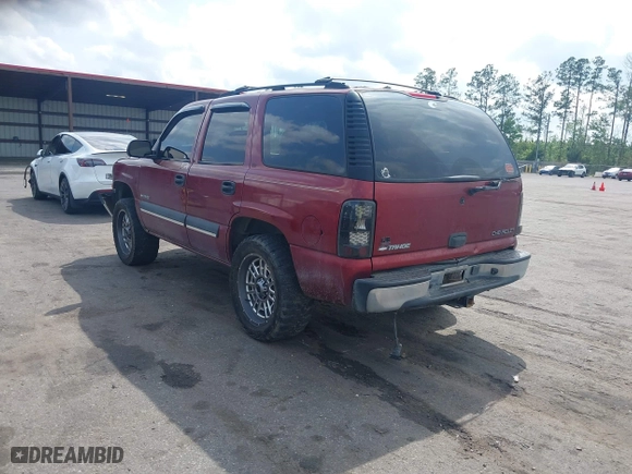2002 Chevrolet Tahoe LT with VIN 1GNEC13ZX2R326813, listed as a IAAI auction lot 41918241 with 278,409 mi miles. Bid and sale history available at carsss.com. Image 3.