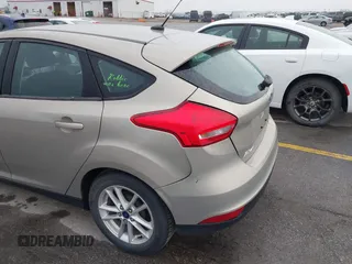 2015 Ford Focus SE with VIN 1FADP3K21FL211511, listed as a IAAI auction lot 42153828 with 126,111 mi miles. Bid and sale history available at carsss.com. Image 6.