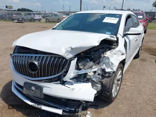 2014 Buick LaCrosse with VIN 1G4GA5GR0EF203953, listed as a IAAI auction lot 42354366 with 143,144 mi miles and . Bid and sale history available at DreamBid. Image 17.