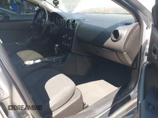 2009 Pontiac G6 1SA with VIN 1G2ZG57N794137061, listed as a IAAI auction lot 42644577 with 233,079 mi miles and . Bid and sale history available at DreamBid. Image 5.