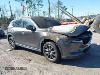 2018 Mazda CX-5 Grand Touring with VIN JM3KFADMXJ1402864, listed as a IAAI auction lot 41781188 with 1 mi miles. Bid and sale history available at carsss.com. Image 1.