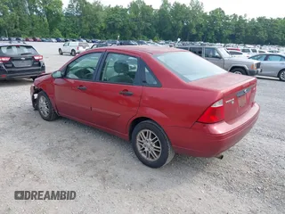 2005 Ford Focus S with VIN 1FAFP34N35W277846, listed as a IAAI auction lot 42423090 with 338,234 mi miles and . Bid and sale history available at DreamBid. Image 3.