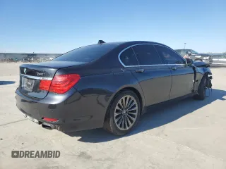 2011 BMW 7 Series 740i with VIN WBAKA4C57BC612487, listed as a Copart auction lot 82633554 with 0 mi miles and Salvage Title. Bid and sale history available at carsss.com. Image 3.