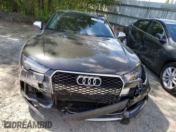 2016 Audi RS 7 Prestige z VIN WUAW2AFC7GN904309, wystawiony jako Copart lot #61766944 z przebiegiem 54 914 mil mil oraz Czysty tytuł • Clean title. Historia ofert i sprzedaży dostępna na DreamBid. Obrazek 5.