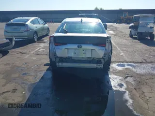2021 Toyota Prius L Eco with VIN JTDKAMFU7M3142616, listed as a IAAI auction lot 42755833 with 40,542 mi miles and . Bid and sale history available at DreamBid. Image 6.