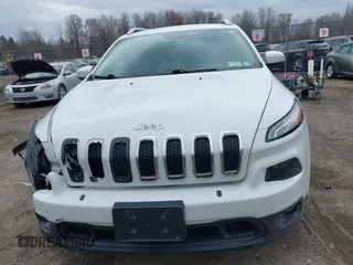 2017 Jeep Cherokee Latitude with VIN 1C4PJMCB3HW530794, listed as a IAAI auction lot 41854670 with 103,798 mi miles. Bid and sale history available at carsss.com. Image 12.