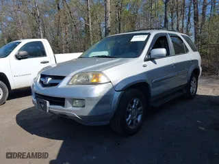 2004 Acura MDX Touring Pkg with VIN 2HNYD18694H521669, listed as a IAAI auction lot 42040542 with 294,325 mi miles. Bid and sale history available at carsss.com. Image 2.