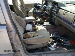 1994 Jeep Grand Cherokee Laredo z VIN 1J4GZ58S5RC328902, wystawiony jako Copart lot #70150474 z przebiegiem 195 604 mil mil oraz Szkoda całkowita • Salvage title. Historia ofert i sprzedaży dostępna na DreamBid. Obrazek 7.