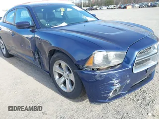 2014 Dodge Charger SXT with VIN 2C3CDXHG1EH207273, listed as a IAAI auction lot 41714382 with 152,023 mi miles. Bid and sale history available at carsss.com. Image 6.