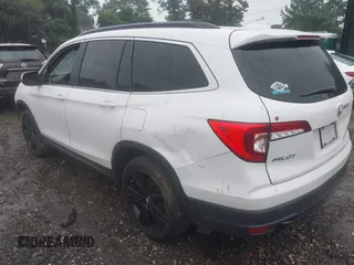 2021 Honda Pilot Special Edition with VIN 5FNYF6H28MB048296, listed as a IAAI auction lot 40012452 with 50,011 mi miles. Bid and sale history available at carsss.com. Image 3.