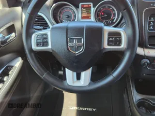 2017 Dodge Journey SXT with VIN 3C4PDCBG4HT598882, listed as a Copart auction lot 56783495 with 89,771 mi miles and Salvage Title. Bid and sale history available at DreamBid. Image 11.