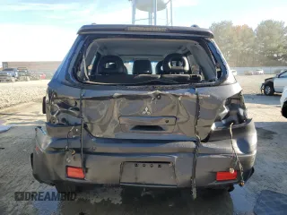 2006 Mitsubishi Outlander z VIN JA4LZ81F96U025401, wystawiony jako Copart lot #78197014 z przebiegiem Nie podano mil oraz Szkoda całkowita • Salvage title. Historia ofert i sprzedaży dostępna na DreamBid. Obrazek 6.