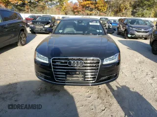 2015 Audi A8 z VIN WAUJGAFD7FN032176, wystawiony jako Copart lot #76943904 z przebiegiem 126 423 mil mil oraz Czysty tytuł • Clean title. Historia ofert i sprzedaży dostępna na DreamBid. Obrazek 5.