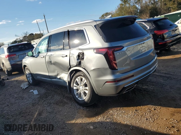 2023 Cadillac XT6 FWD Luxury z VIN 1GYKPAR48PZ115719, wystawiony jako Copart lot #87848435 z przebiegiem 17 597 mil mil oraz Szkoda całkowita • Salvage title. Historia ofert i sprzedaży dostępna na DreamBid. Obrazek 2.
