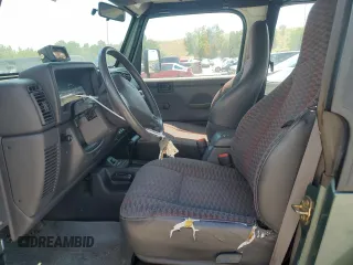 2000 Jeep Wrangler Sport с VIN 1J4FA49S4YP710633, выставлен на аукционе Copart как лот 65095875 с пробегом 107 613 миль миль и Чистый • Clean title. История ставок и продаж доступна на DreamBid. Изображение 7.