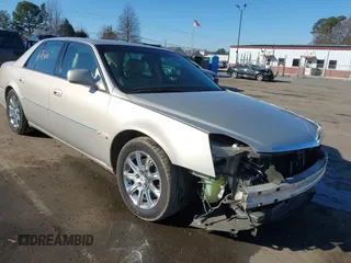 2008 Cadillac DTS w/1SD with VIN 1G6KD57Y38U189319, listed as a IAAI auction lot 41314470 with 138,106 mi miles. Bid and sale history available at carsss.com. Image 1.